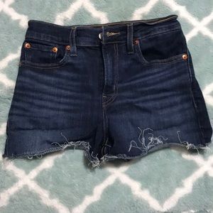 Levi’s high rise jean shorts, size 25
